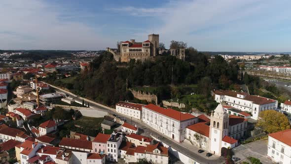 Drone view of Leiria castle surrounded by historic Leiria city; Portugal alt