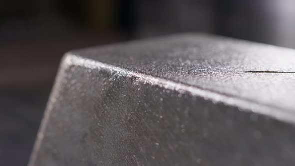 Close Up at the Edges of Processed and Polished Silver Bar at the Factory alt