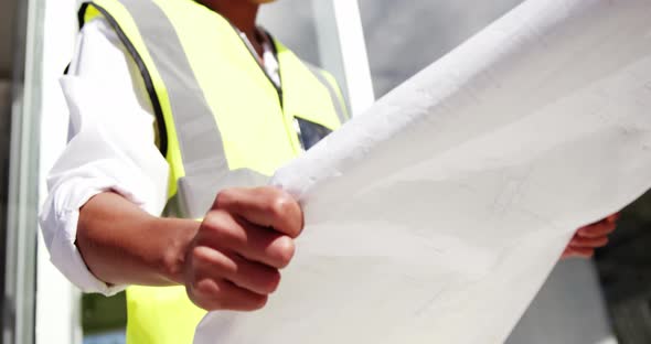 Architect reading plan alt