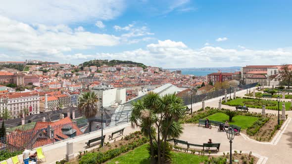 4K timelapse of Lisbon rooftop from Sao Pedro de Alcantara viewpoint - Miradouro in Portugal - UHD