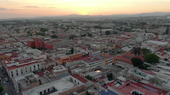 Flight From Templo de San Antonio de Padua Towards the West part of the City At Dusk In Santiago de alt