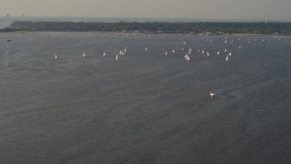 Slow Aerial Tilt Up of Sail Boats on Manhasset Bay Long Island alt