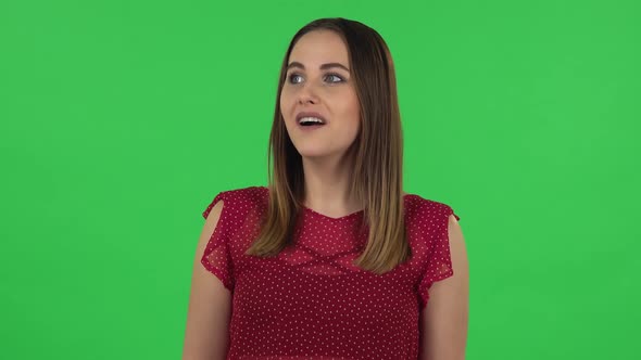 Portrait of Tender Girl Is Shocked and Surprised at What Is Happening Around, Looking with Delight alt