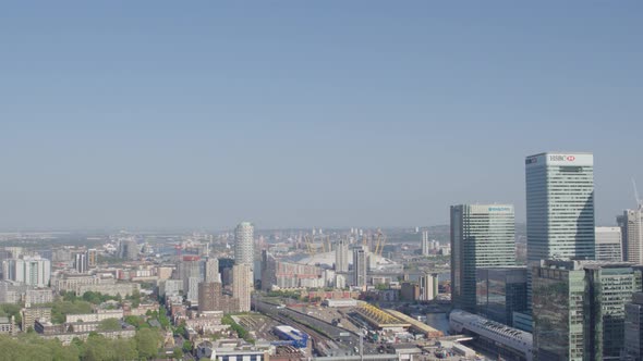 Elevated aerial view of financial skyscrapers in Canary Wharf in East London shot from UAV during th alt