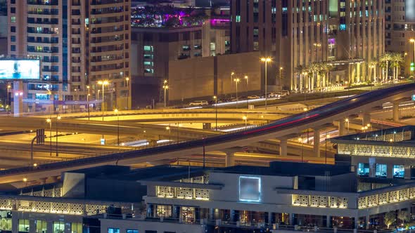 Night Traffic on a Busy Intersection on Sheikh Zayed Highway Aerial Timelapse alt