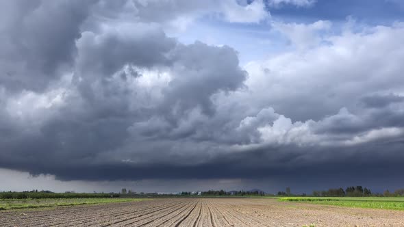 Variable Weather and Clouds on Uncultivated Agricultural Land alt
