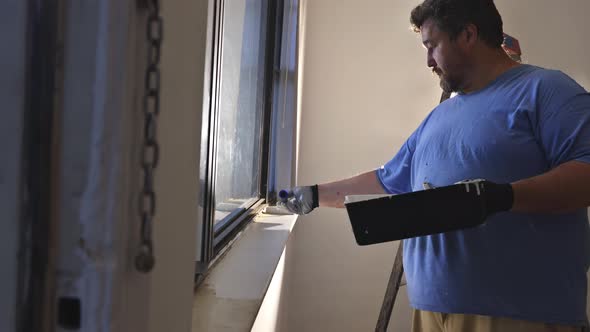 Removing White Light Switch Cover Plastic on Preparation Wall for New Paint Wall alt