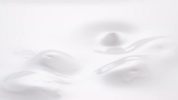 Blueberries Falling Into Thick White Cream alt