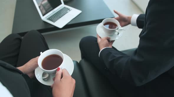 Unrecognizable Office Workers With Coffee Cups alt