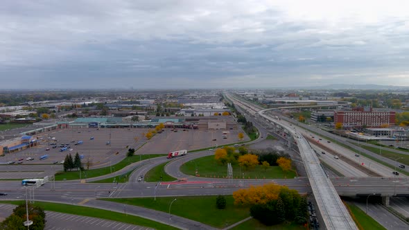 4K camera drone view of the intersection of St Jean Boulevard and Highway 40 in Montreal.