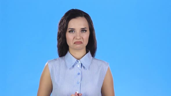 Pretty Young Woman Is Listening and Showing Thumbs Up. Slow Motion alt