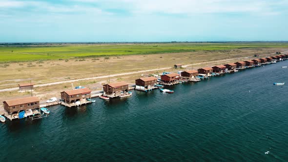 Aerial view of many fishermen huts at the gulf. alt