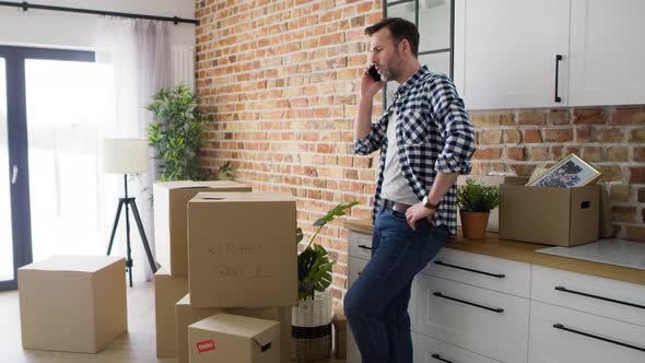 Video of displeased man calling for help with moving house. Shot with RED helium camera in 8K. alt