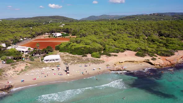 Aerial footage of the beautiful town of Ibiza in Spain showing the beach front alt