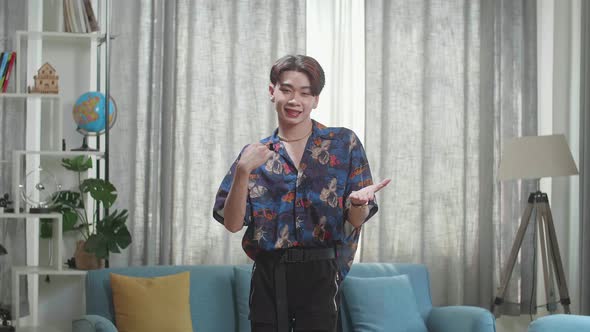 Asian Transgender Male Dancing While Shooting Video Content For Social Networks At Home alt