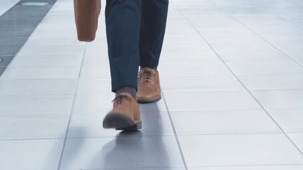 Low Section Of Businessman Walking