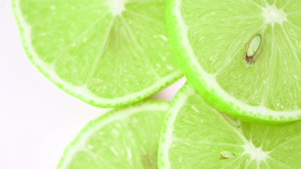 slices of lime rotate close-up