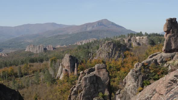 Slow pan on valley with Belogradchik group of rocks 4K 2160p 30fps UltraHD footage - Strange natural alt