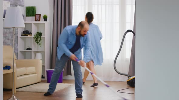 Man Mopping the Floor alt