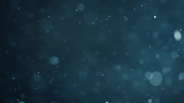 Floating Abstract Particle Bokeh on Dark Background alt