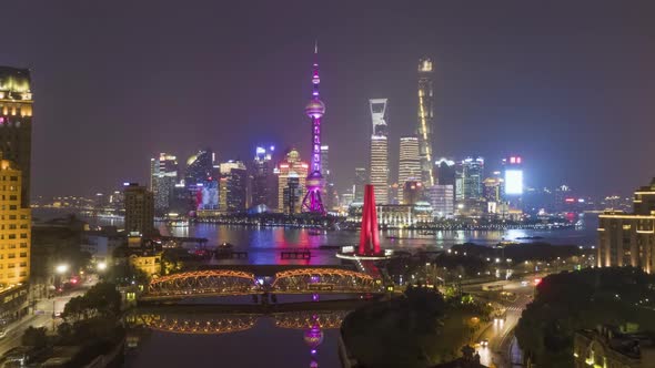 Shanghai Skyline at Night. Lujiazui District, Huangpu River and Waibaidu Bridge. China. Aerial View alt