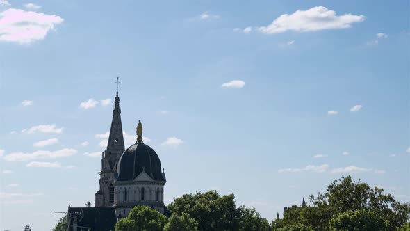 Clouds above church Notre Dame alt