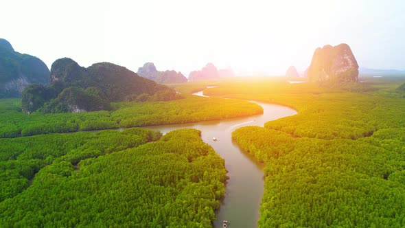 Aerial view from a drone over many islands at Phang Nga Bay during sunset time alt