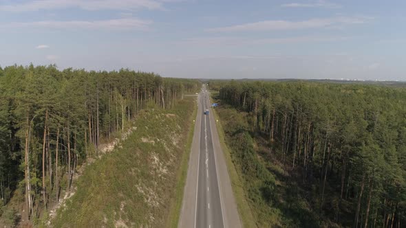 Aerial view of the highway in the autumn forest 06 alt