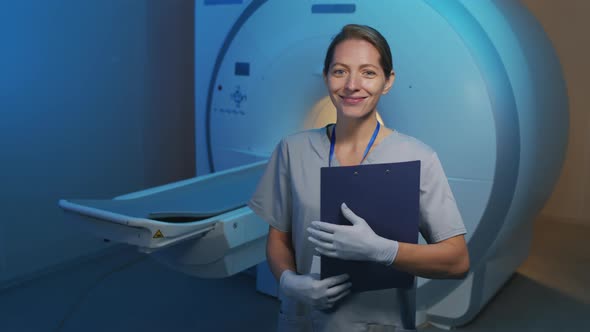 Portrait of Smiling Female Doctor in Radiology Room alt