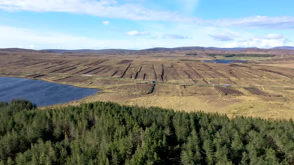 Flying From Slieve League Towards Lough Auva in County Donegal  Ireland alt