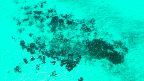 Luxury birds eye tourism shot of a sandy white paradise beach and blue sea background in best qualit alt