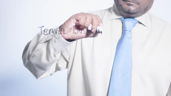 Asian Businessman Writes Travel Insurance  