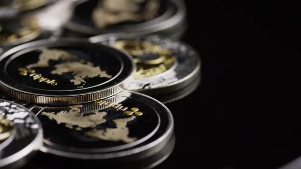 Rotating shot of Bitcoins (digital cryptocurrency) - Ripple alt