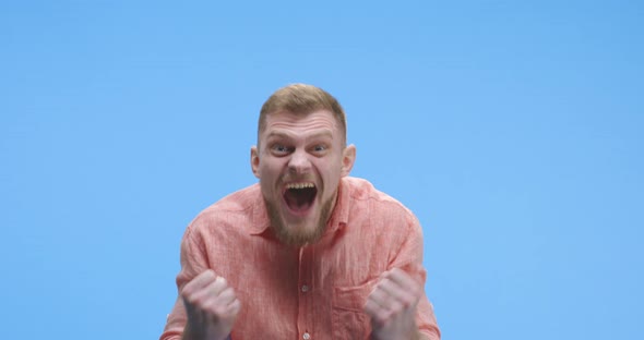 Young Man Celebrating Success alt