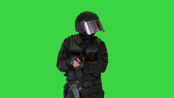 Anti Terrorist or Riot Unit Walking and Aiming with a Pistol on a Green Screen Chroma Key alt