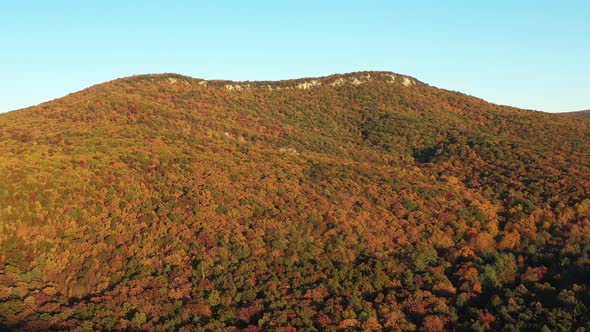 An aerial tracking shot of Halfmoon Mountain, located in West Virginia's Trout Run Valley. Autumn co alt