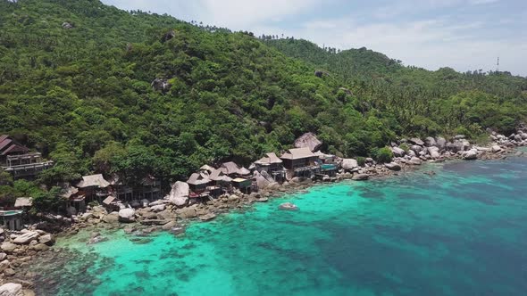 Tropical Island Koh Tao with Turquoise Water Bay and Residental Area on Shore in Thailand. Aerial
