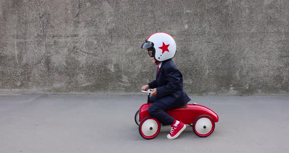 Funny businessman driving retro car outdoor alt