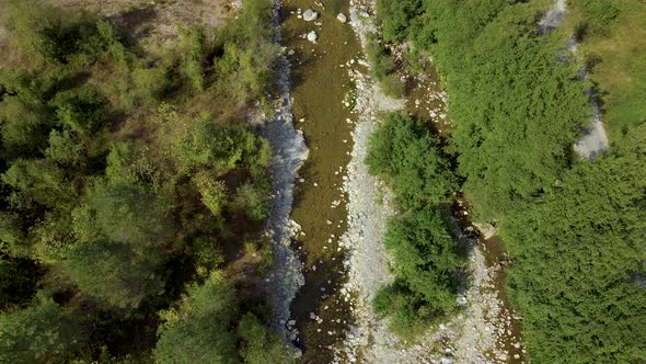 steep green mountains, deep forest and mountain road, beautiful valley and river alt