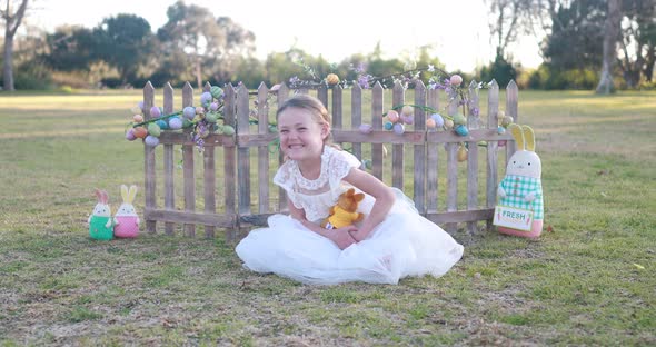 Girl Smiles in her Easter Dress