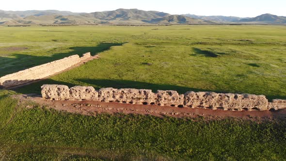 Ruins of Ancient City, Building and Wall From Ancient Times in Treeless Vast Plain of Mongolia alt