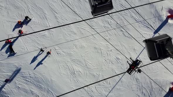 Aerial View of the Alps Mountains in France. Mountain Tops Covered in Snow. Alpine Ski Facilities