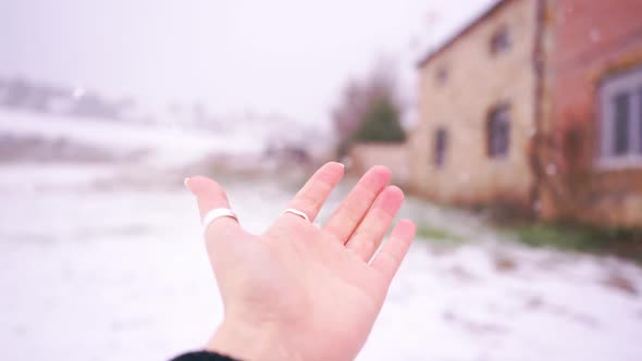 Snowy Hand And Villaje