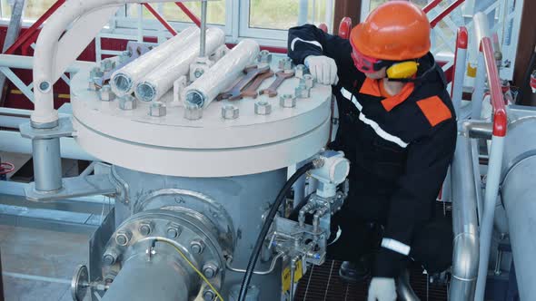 A Mechanic Prepares Copper Wrenches for Replacement with Gas Filter Equipment alt