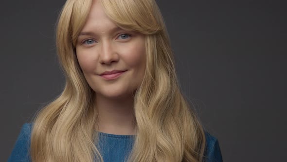 Nordic Blond Model in Studio with Dramatic Top Light alt