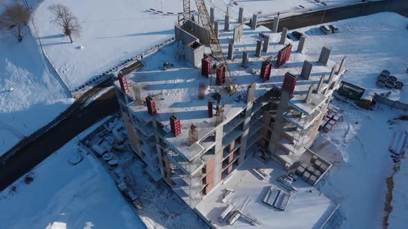 Aerial shot of building residental house on construction site.