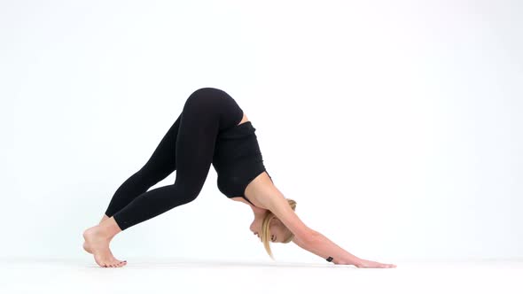 Healthy and Fitness concept - Beautiful American African lady in fitness cloth doing yoga alt