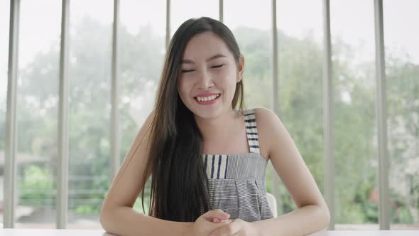Beautiful  transgender Asian woman is greeting through video calls