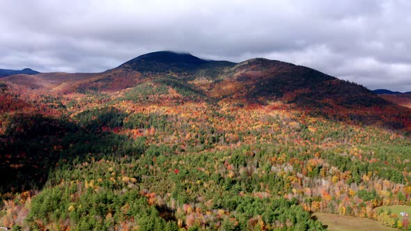 Aerial flythrough of Mountain Forests in Autumn with Fall Colors in New England