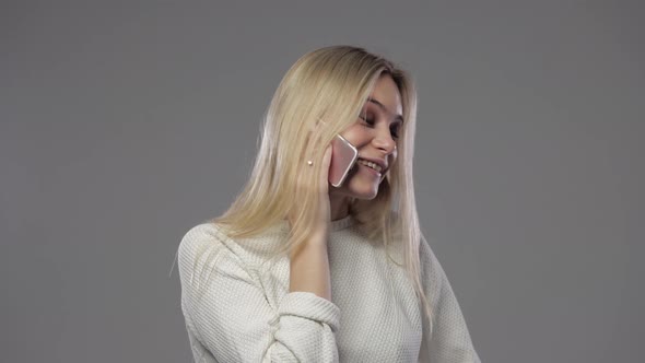Blonde Talking on the Phone